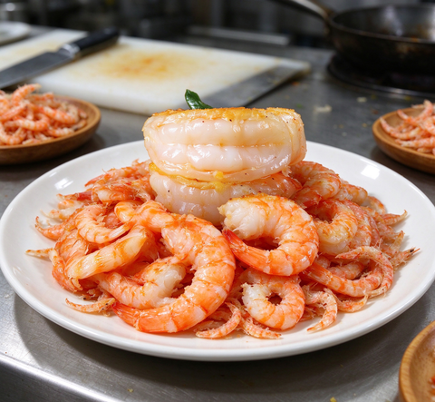 Cooked pink king prawns
